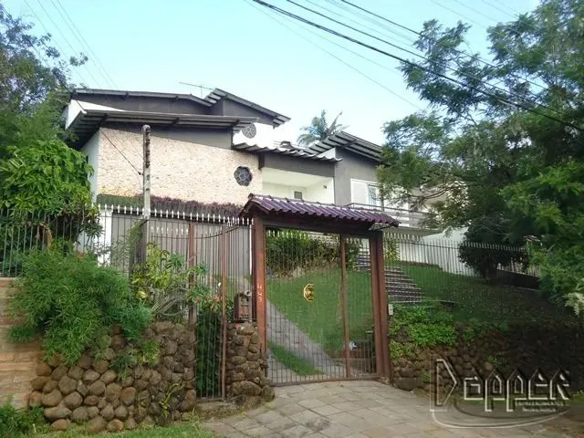 Casa residencial à venda no bairro Ouro Branco com 350 m² e 5 dormitórios/quartos.