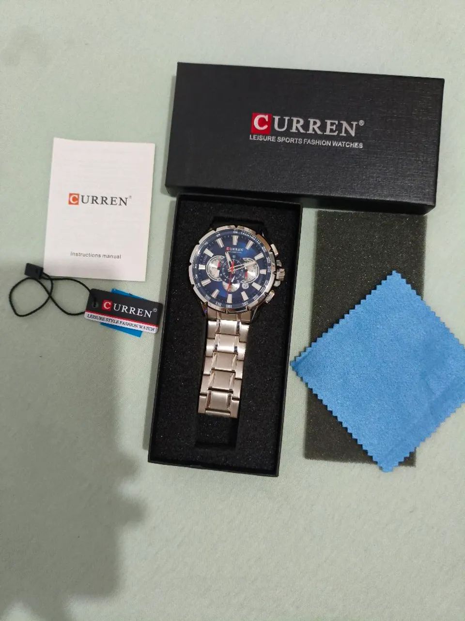 Relógio curren azul e prata 