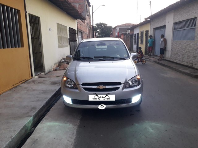 CORSA 2011 COMPLETO VENDER LOGO