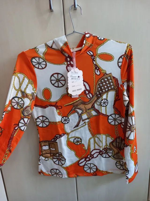 Blusa de manga comprida e com estampas - Foto 2