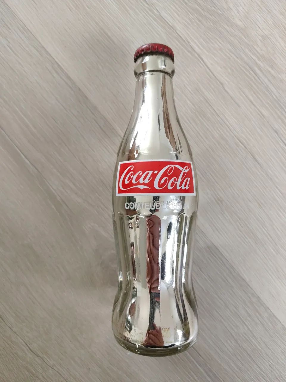 Garrafa Coca-Cola cromada de vidro