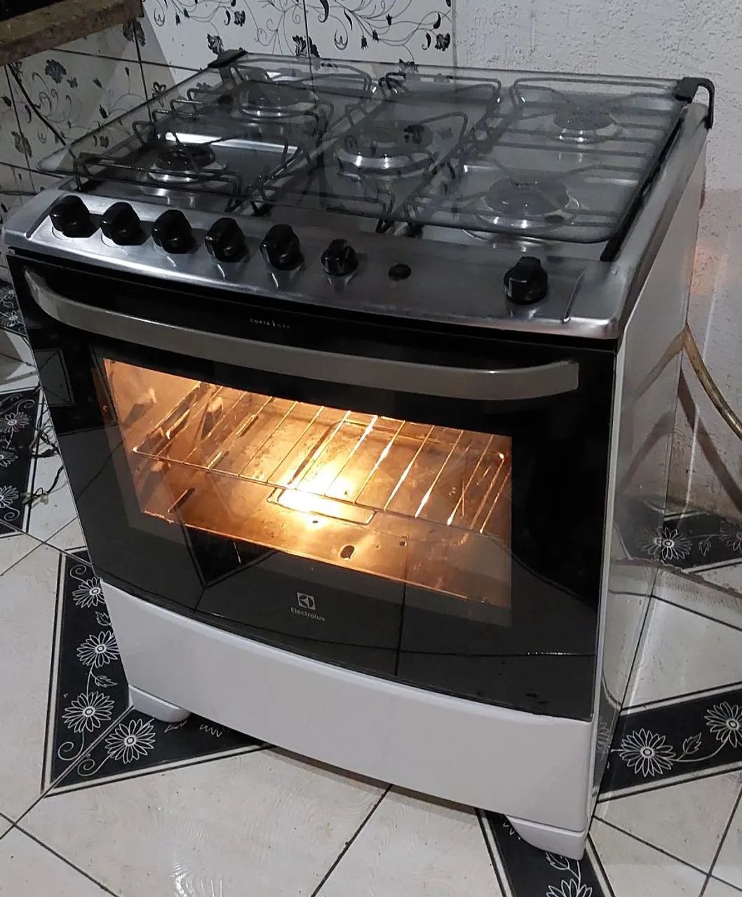 Excelente fogão Electrolux top automático com tripla chama automático com prateleira  - Foto 3