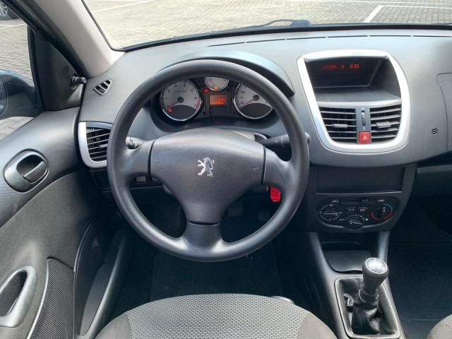 Peugeot 207 Passion XR 2011/2012 1.4 8V Flex 4P Manual - 2012 - Foto 8
