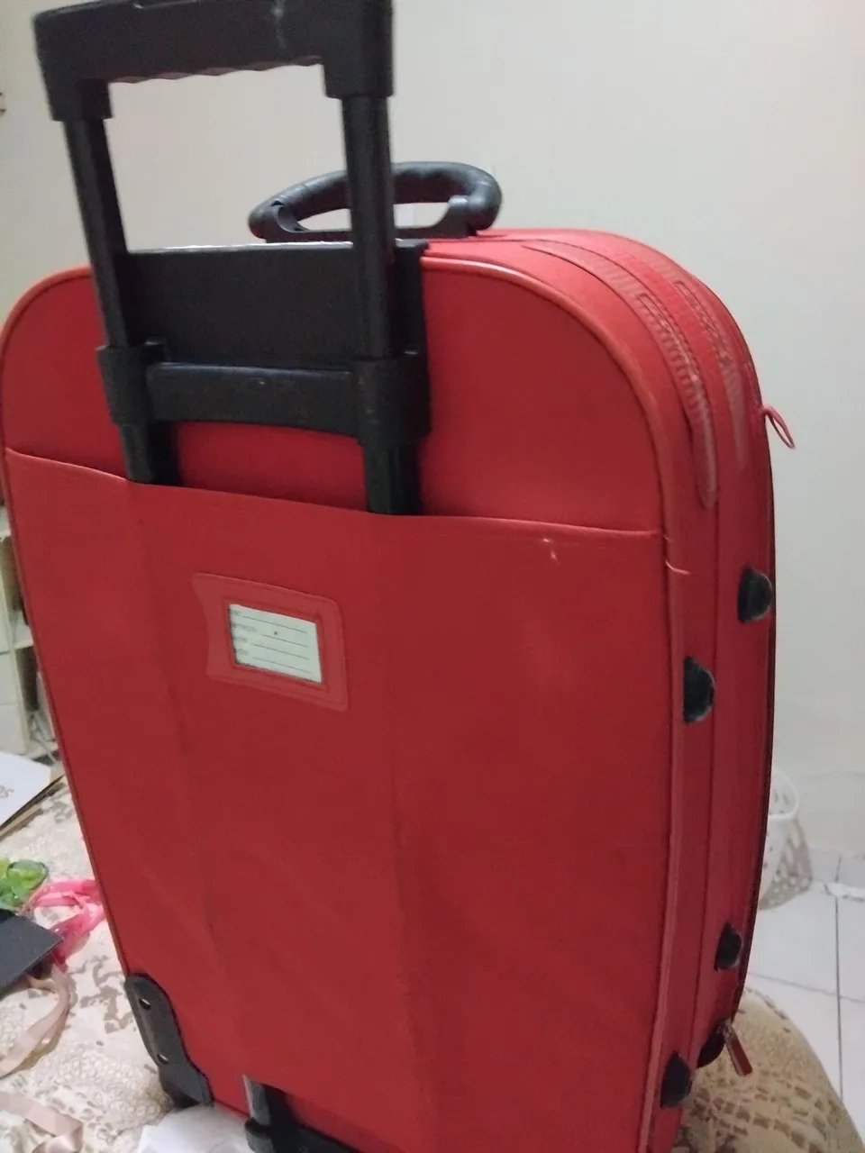 Mala de viagem vermelha