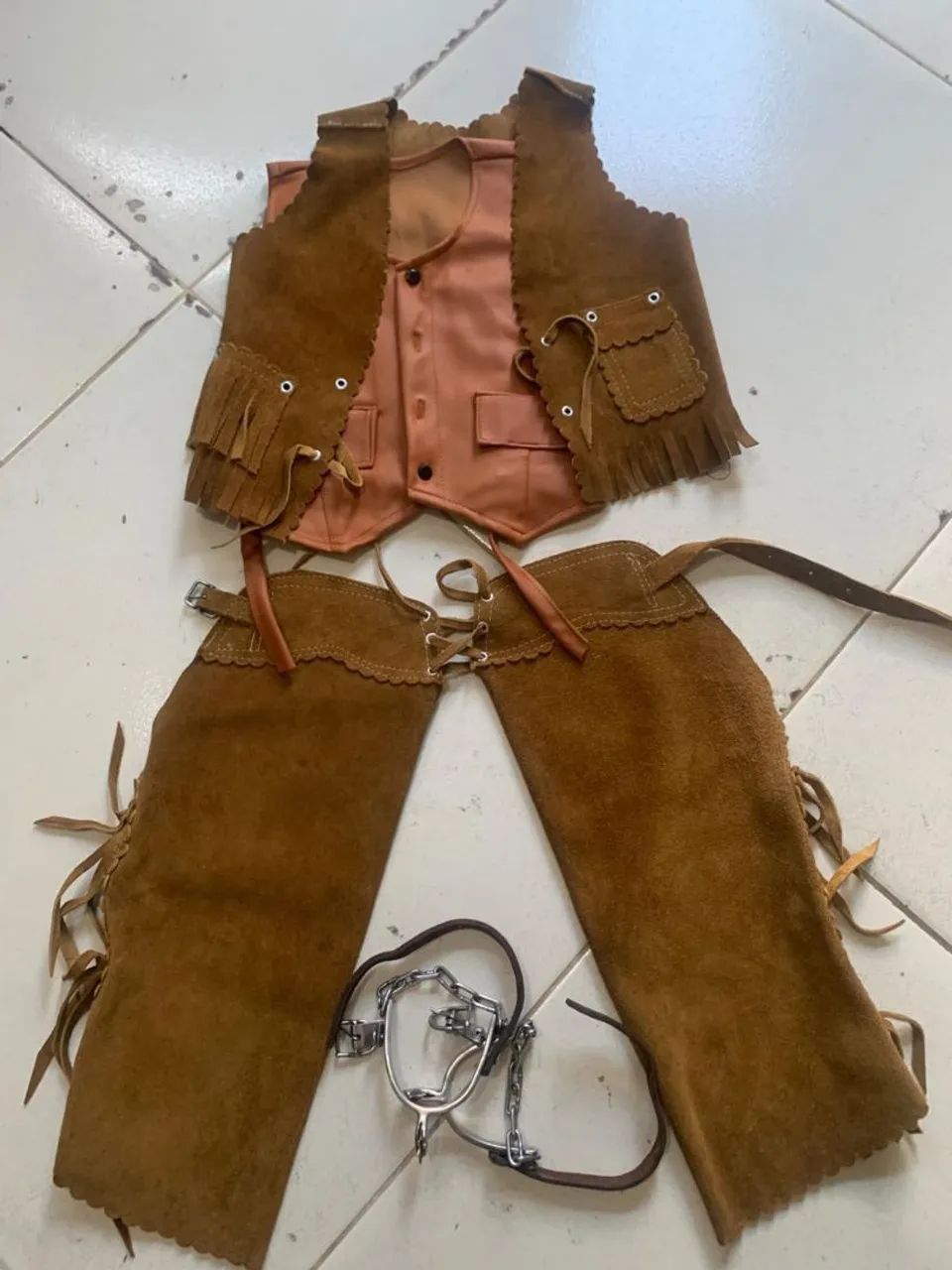 Roupa de couro vaqueiro(a)