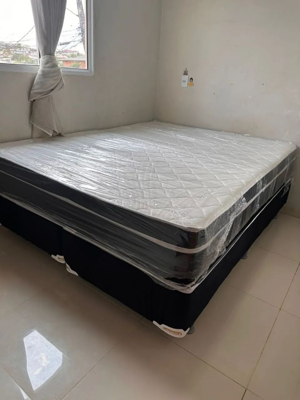 Cama casal de mola 