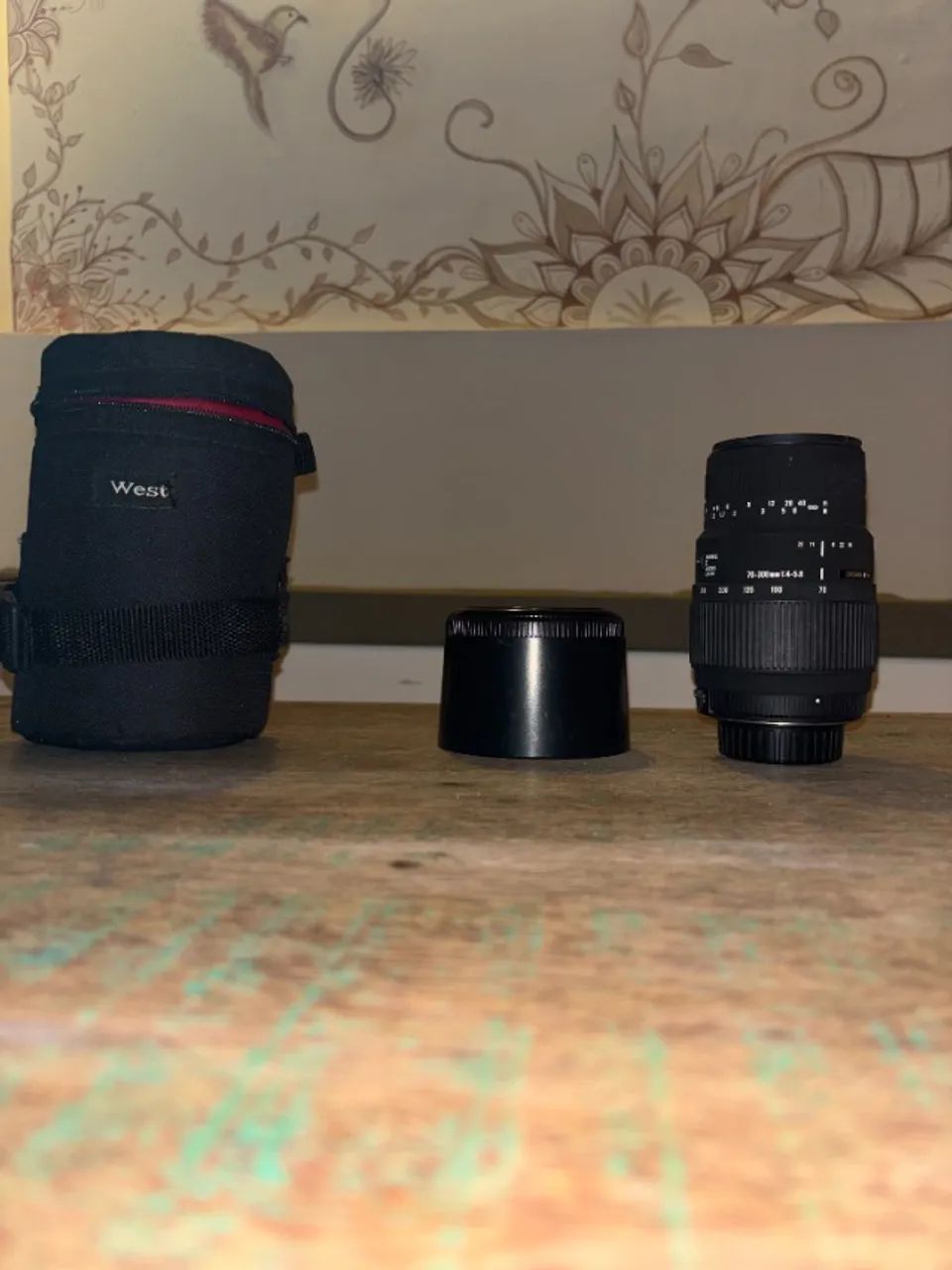 Teleobjetiva SIGMA 70-300 (com parasol e case de proteção)