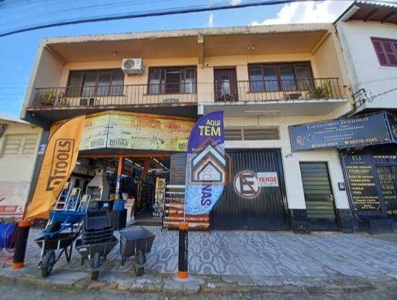 Prédio comercial com loja e dois apartamentos com piscina, bairro americana, Alvorada