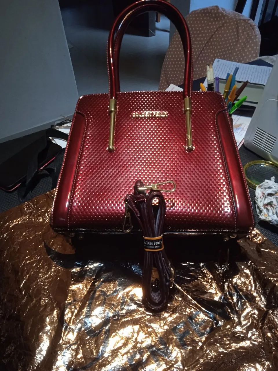 Bolsa Golden fênix nova sem uso 