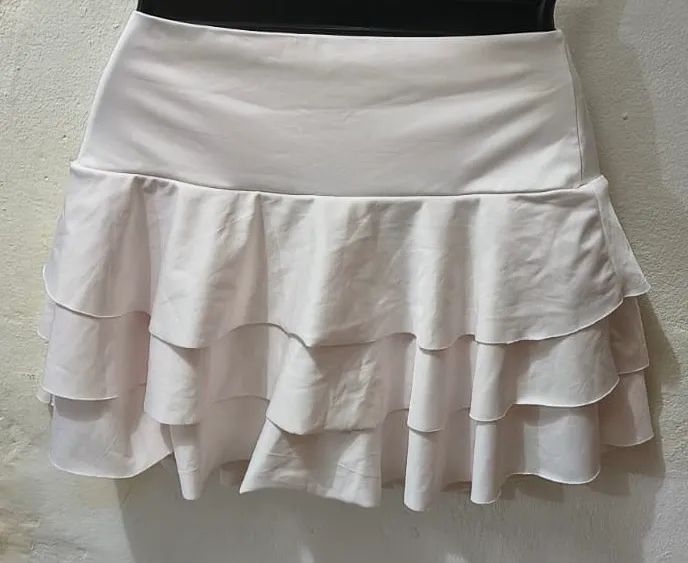 short saia com babados rosa claro 