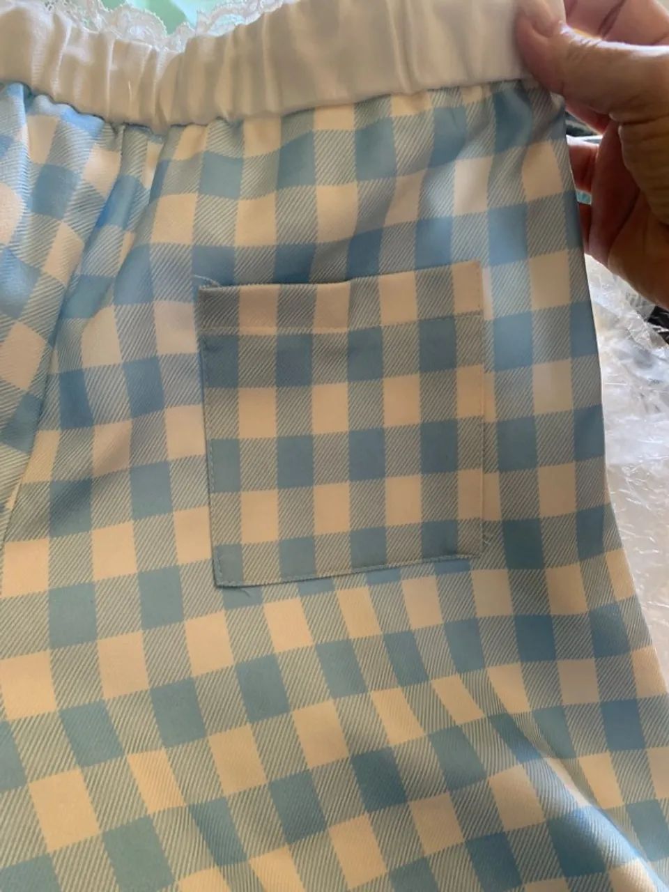 CALÇA XADREZ AZUL E BRANCO COM TORÇAL- P 