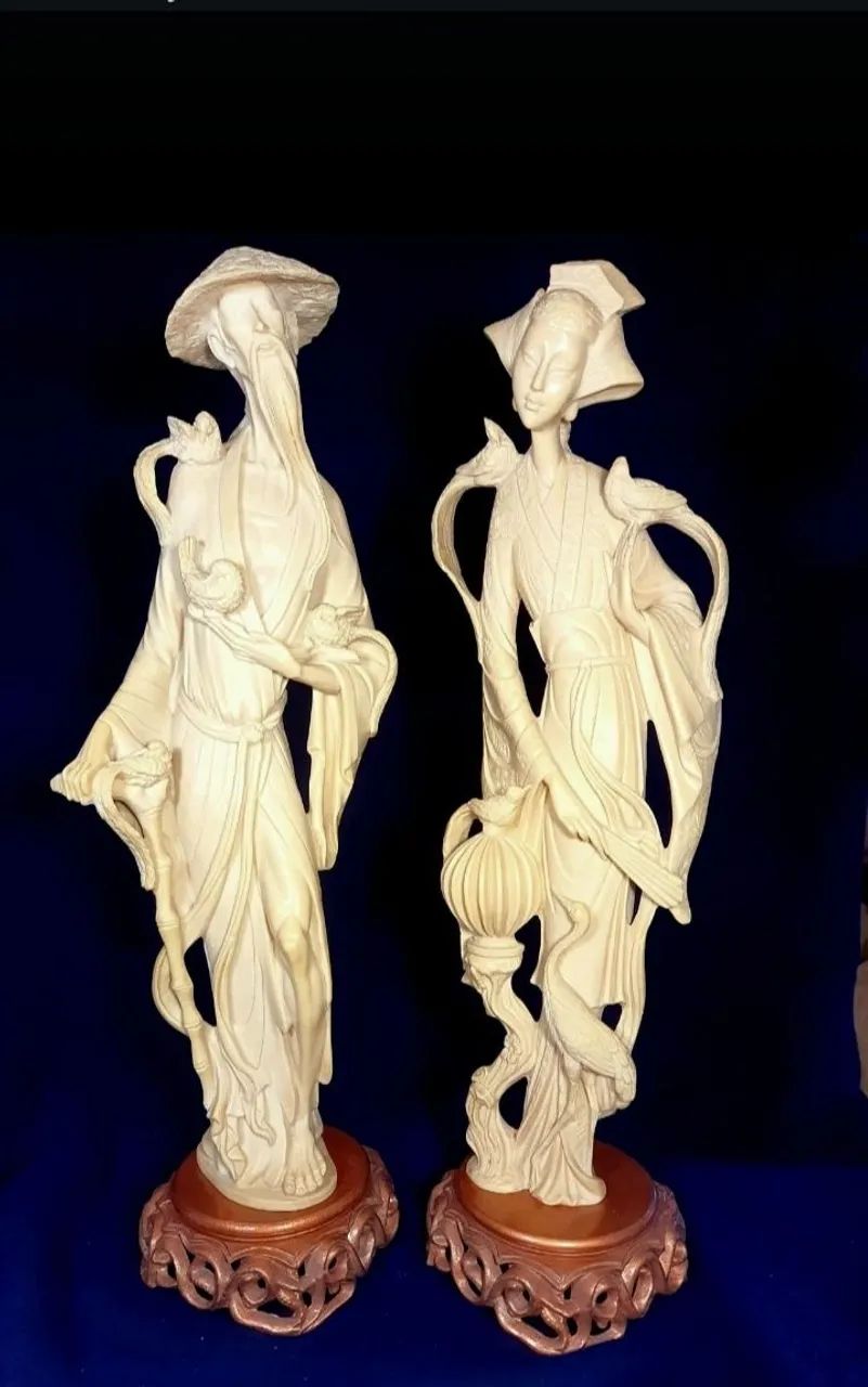 Estátuas de casal oriental 