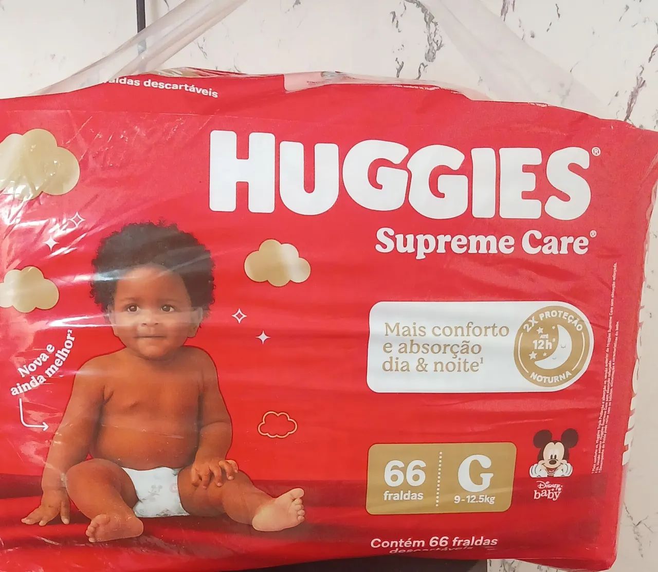Fralda Huggies G 66 unidades 