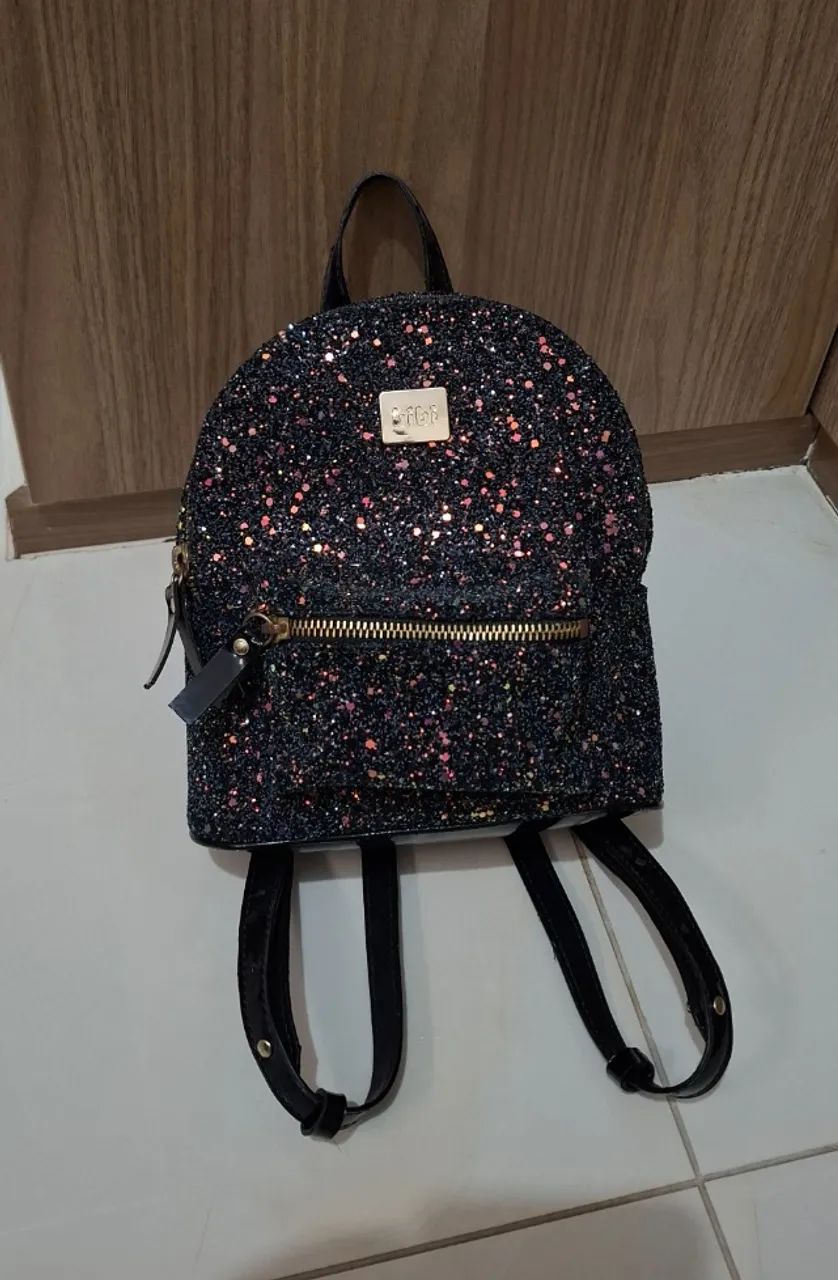 Mochila infantil Bibi preta de glitter 