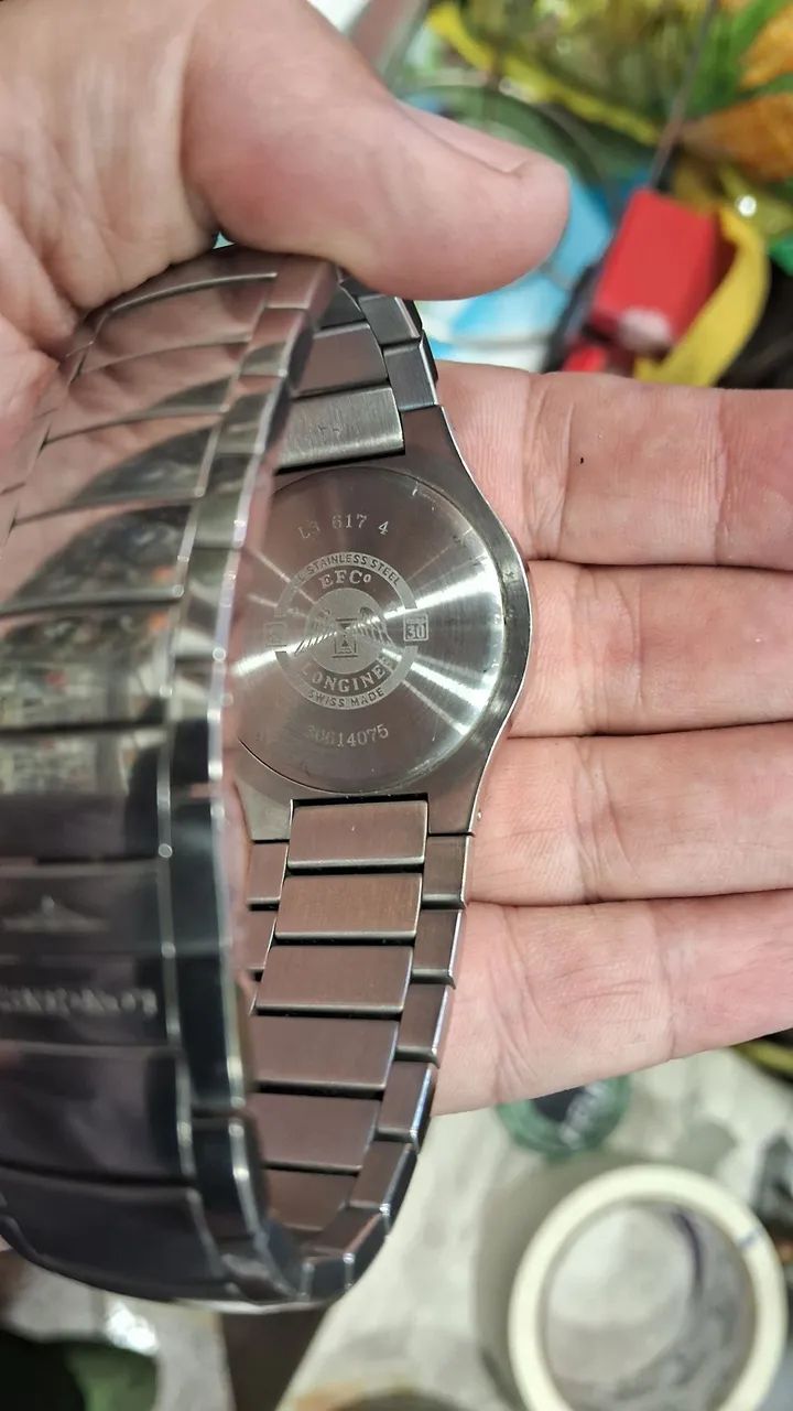 relógio é um Longines Oposition em aço inoxidável com mostrador branco. - Foto 2