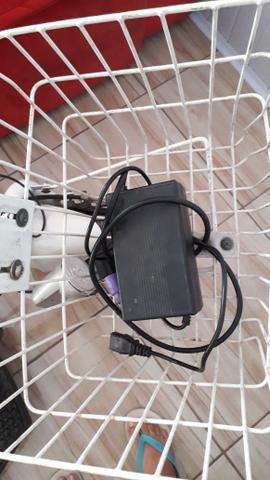 Triciclo elétrico com carregador - Foto 4