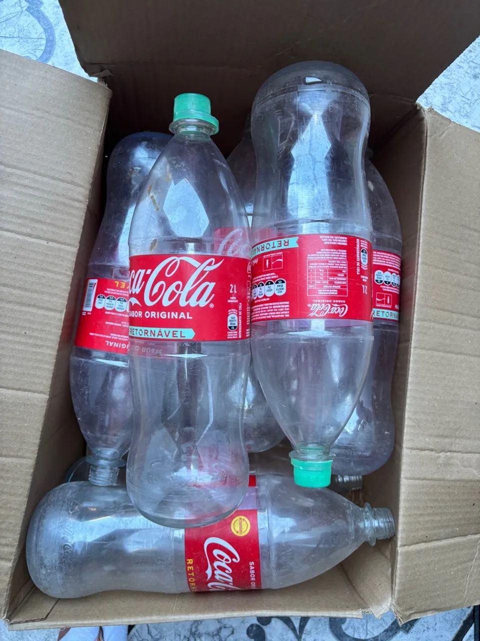 Cascos de Coca-Cola retornáveis 