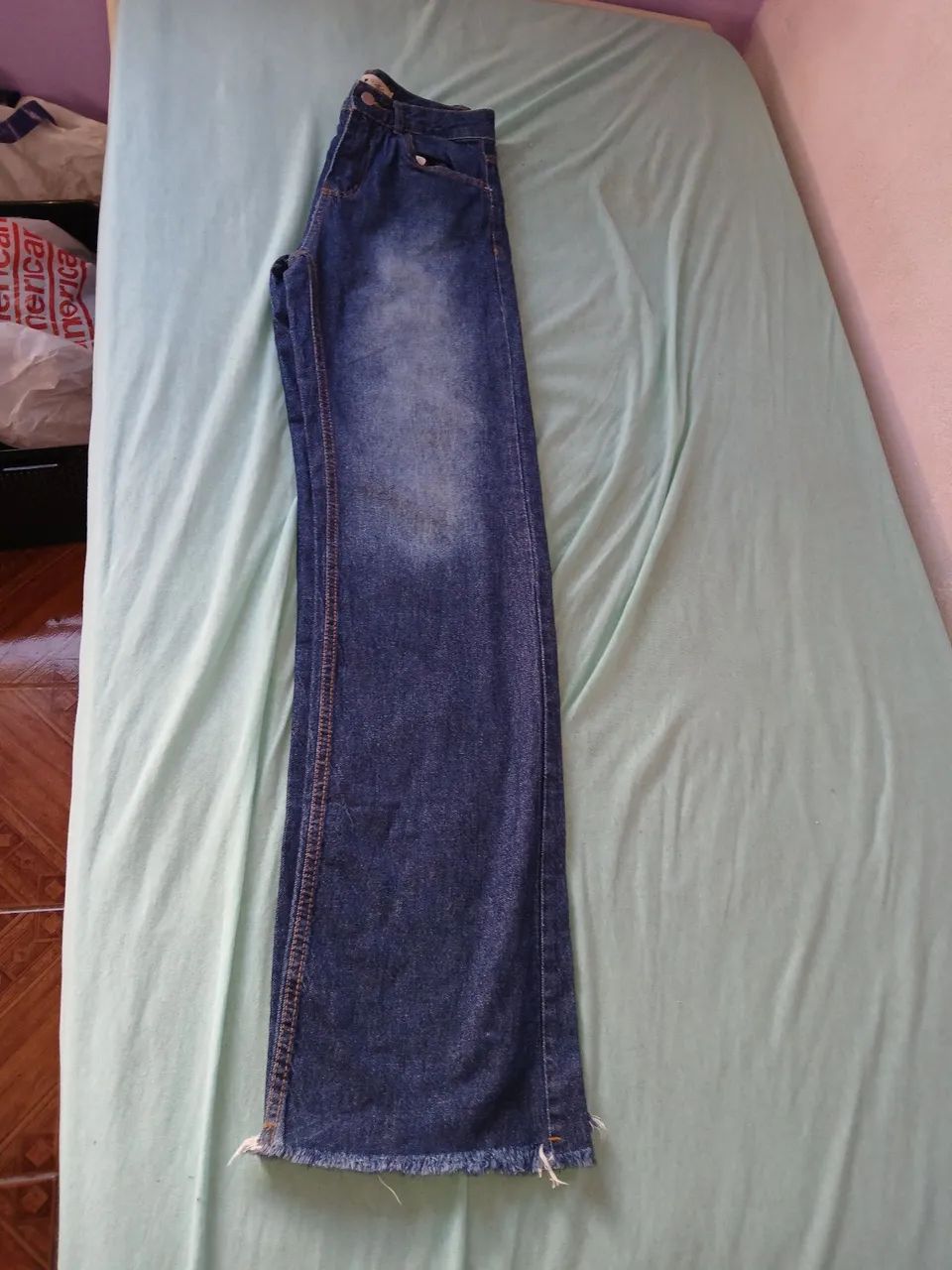 Calça jeans boca de sino - Foto 3