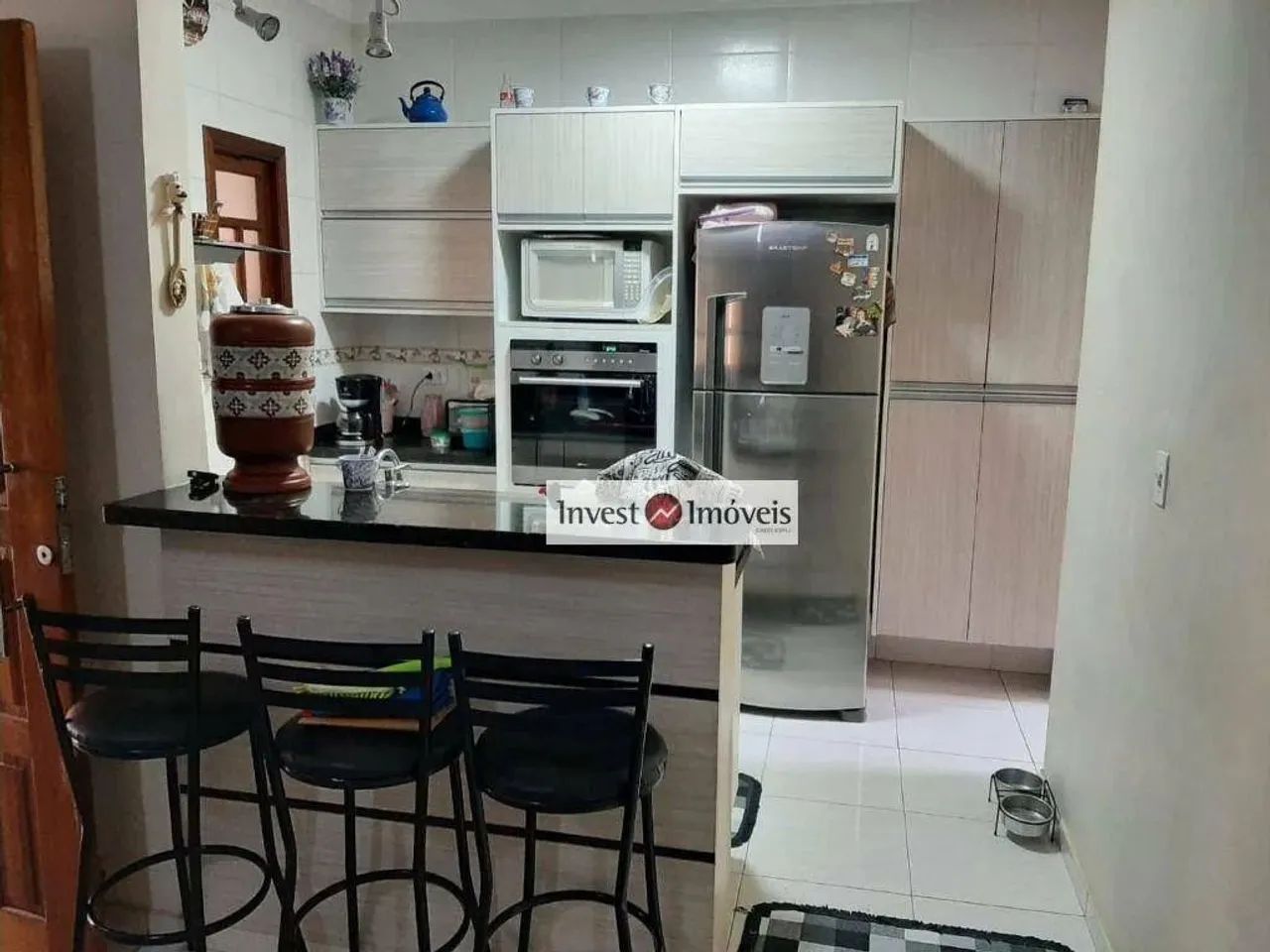 Casa com 3 dormitórios para alugar, 90 m² por R$ 2.329,87/mês - Residencial Santa Paula - 