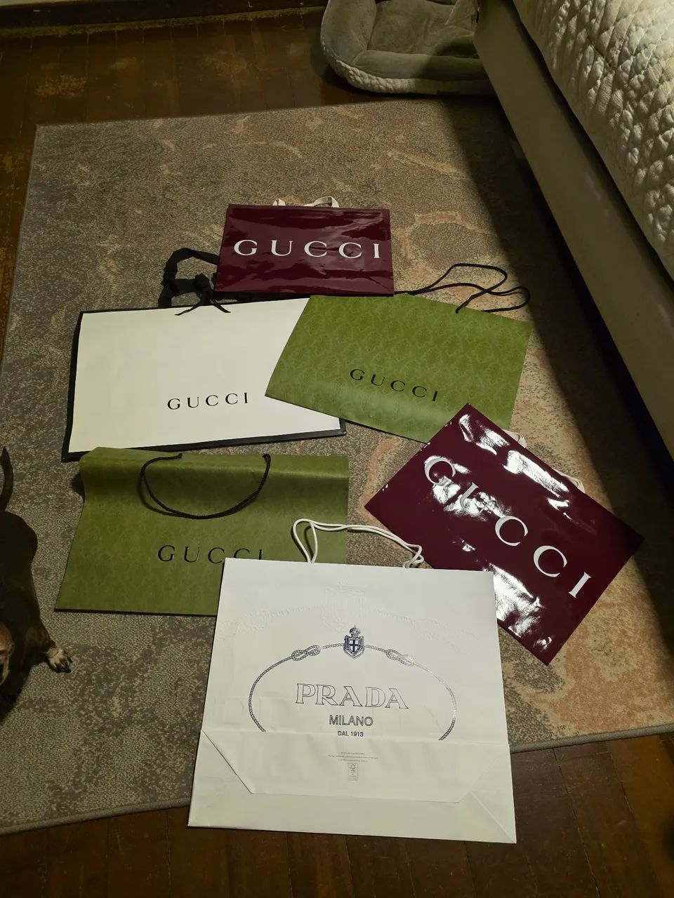 Sacolas grandes Prada, Gucci