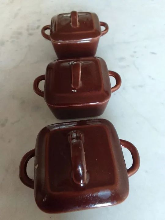 Three small brown bowls