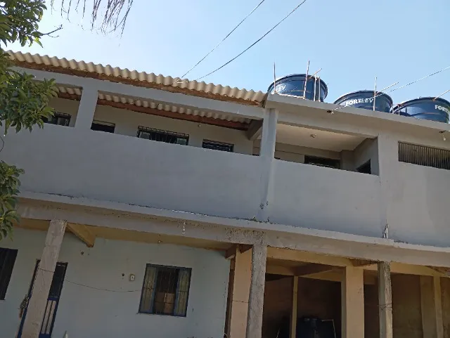 Vendo Imóvel com 2 casas no quintal amplo. Localização bairro Mangueira Nova Iguaçu.