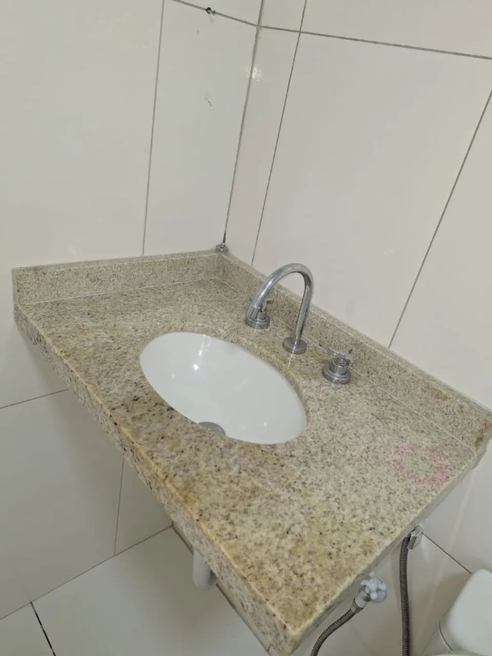 Granite countertop with sink and faucet