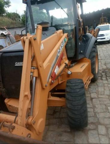 Retro escavadeira 580m