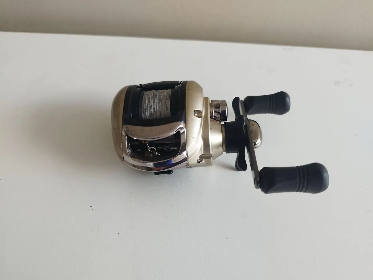 Carretilha de pesca Marine sporte elite 3.000 esquerda dourada - Foto 2