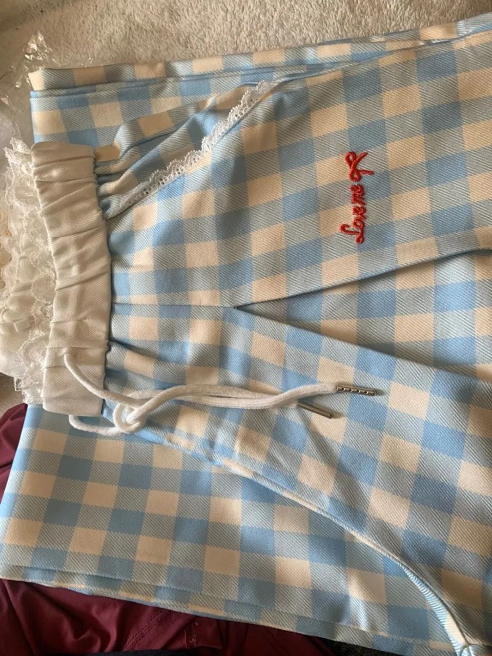 CALÇA XADREZ AZUL E BRANCO COM TORÇAL- P  - Foto 4