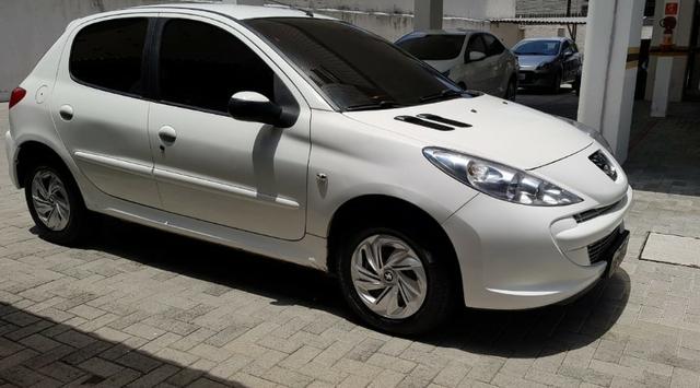 Peugeout 207 2011 HB XR 1.4 flex Novíssimo com cheiro de novo ,perfeito para uber couro - Foto 3