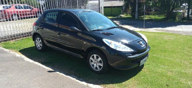 Peugeot 207 1.4 ano 2011 completo - Foto 5