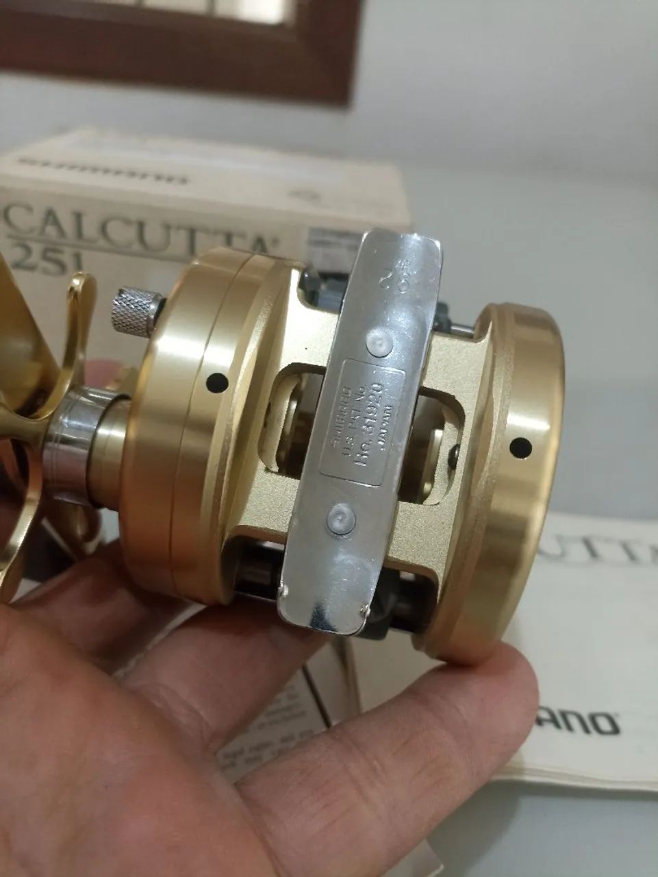 Carretilha  Shimano Calcutta 251 nova - Foto 4