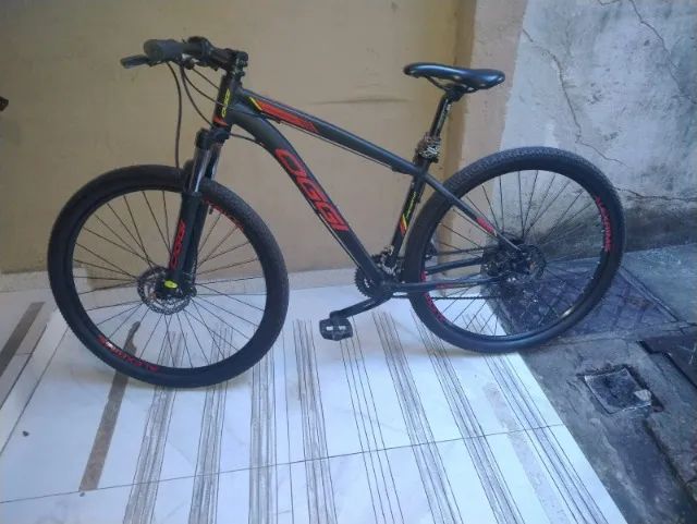 Bicicleta OGGI ARO29 HACKER HDS 24V  vermelha