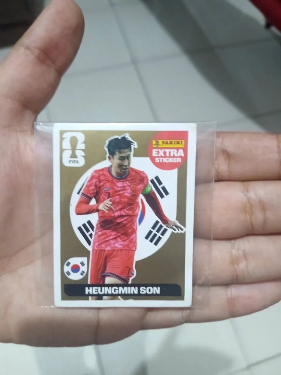 Figurinha do son legend dourada