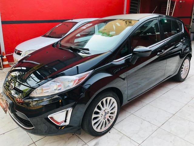 Fiesta 2012 new 1.6 flex completo + rodas de liga, carro impecável !!! - Foto 7