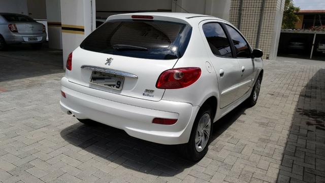 Peugeout 207 2011 HB XR 1.4 flex Novíssimo com cheiro de novo ,perfeito para uber couro - Foto 4