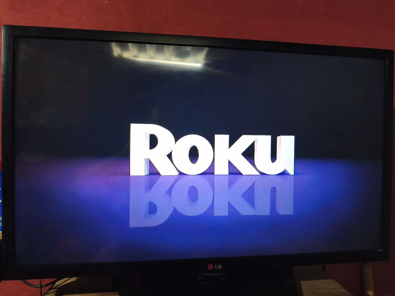 TV LG 32 POLEGAS com aparelho que a deixa smart sistema Roku tv64306323702914120