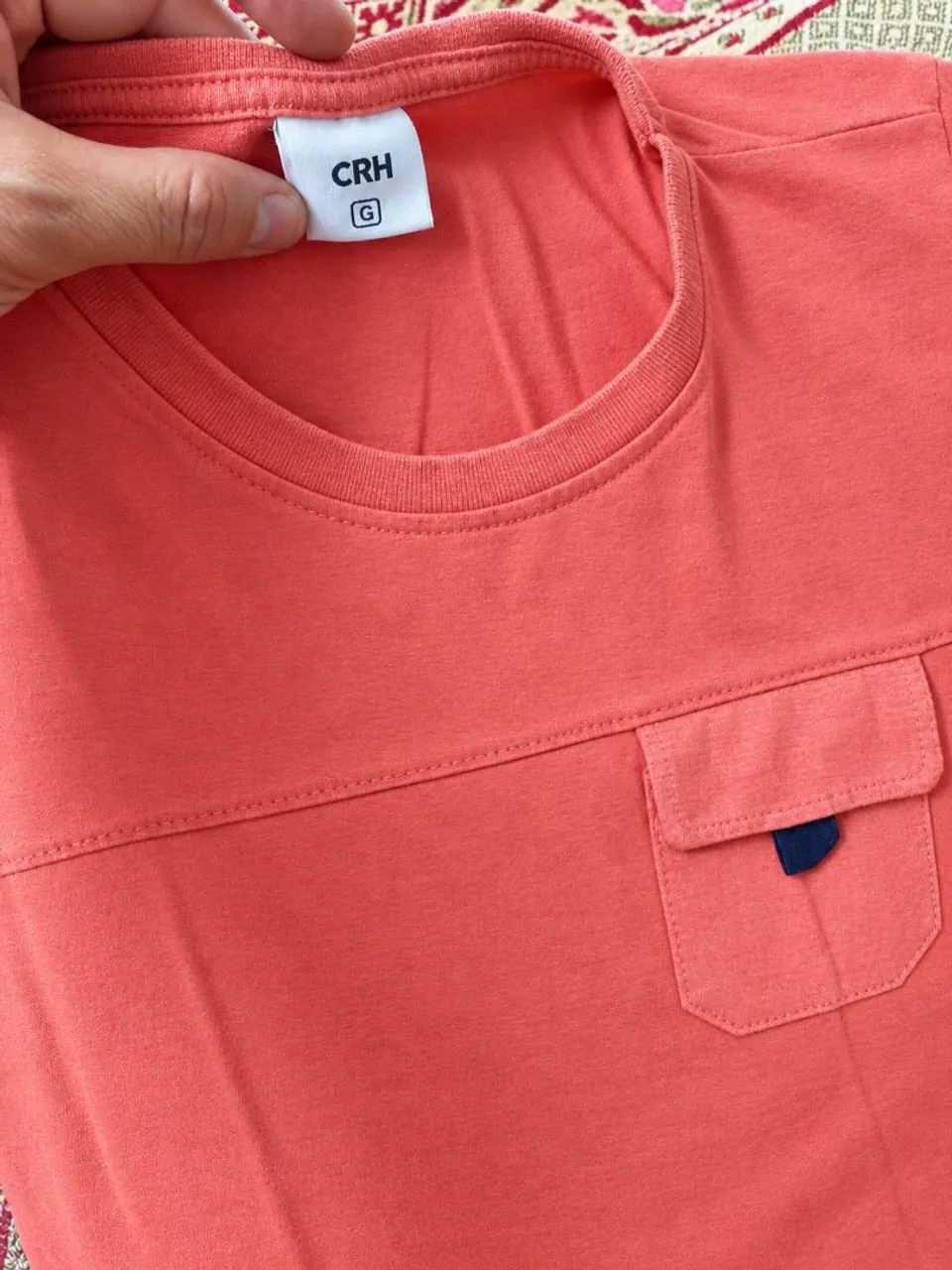 Uma bolsa  de roupas infantis  - Foto 5