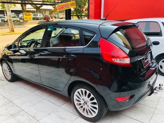 Fiesta 2012 new 1.6 flex completo + rodas de liga, carro impecável !!! - Foto 5