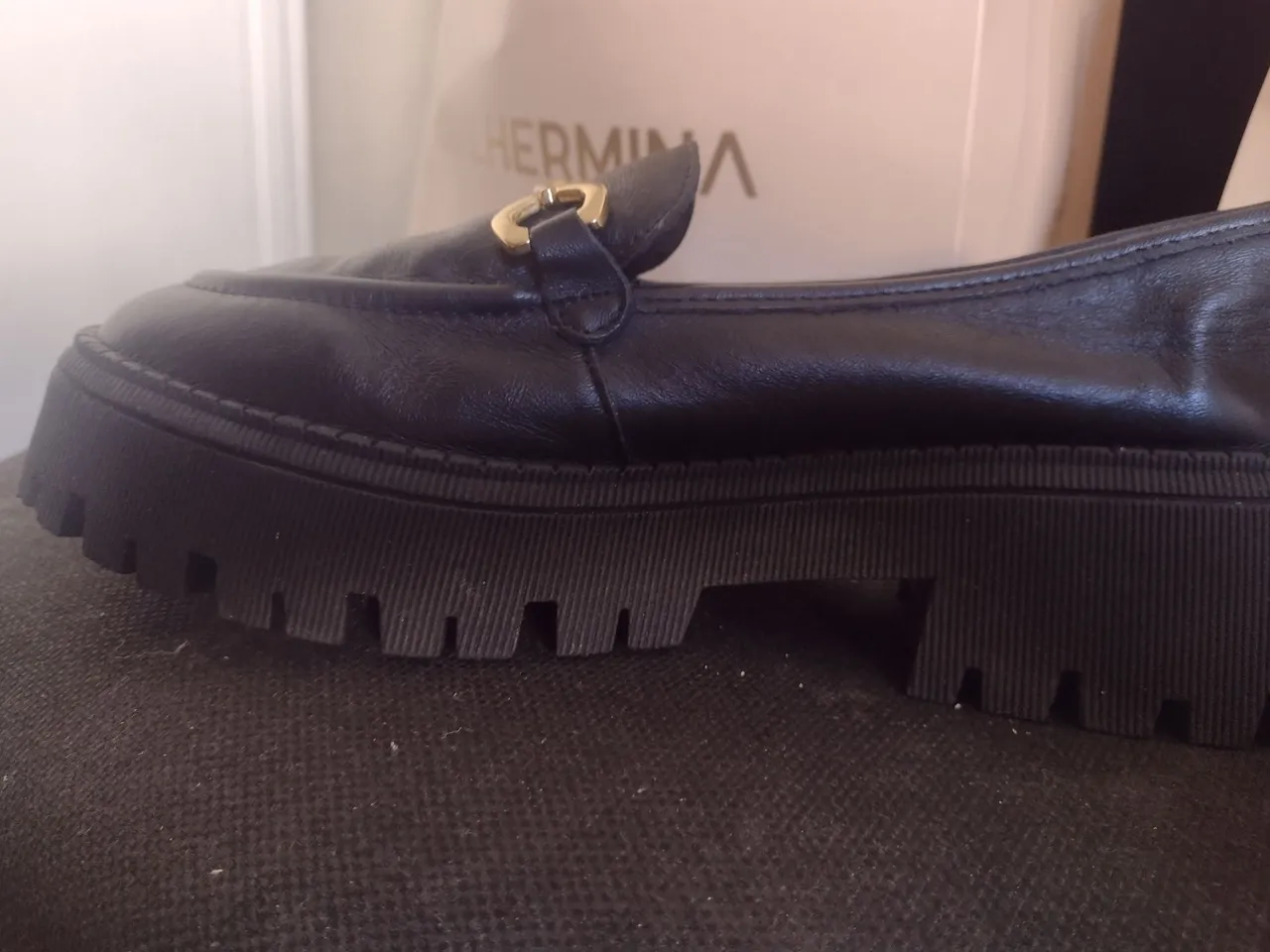 Mocassin de couro preto Arezzo