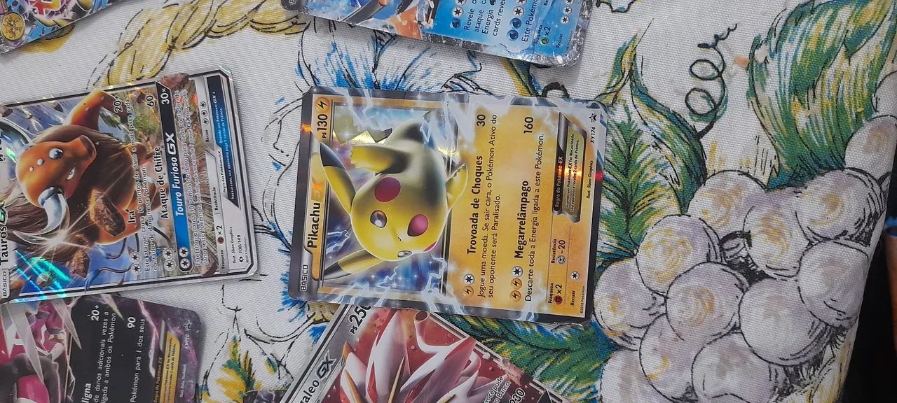 Cartas pokemon + caixa e moeda - Foto 3