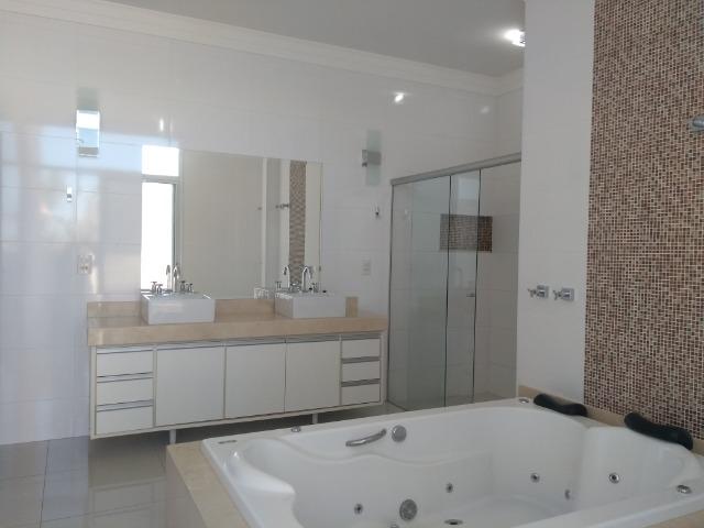 Sobrado no cond. Jd. Botanico 4 dormitórios 1 suíte e 3 apartamentos, piscina com SPA - Foto 18