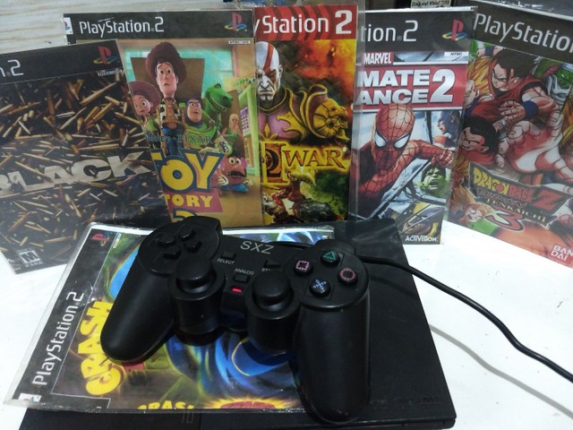 PCImbativel - Loja de Informatica - Porto Alegre - PC Gamer, Notebook,  Celular. Distribuidora. COMPRA e VENDA DE NOVOS E USADOS. Games,  acessórios, Manutenção. Play 2 - Desbloqueado Usado + 2 Controles +