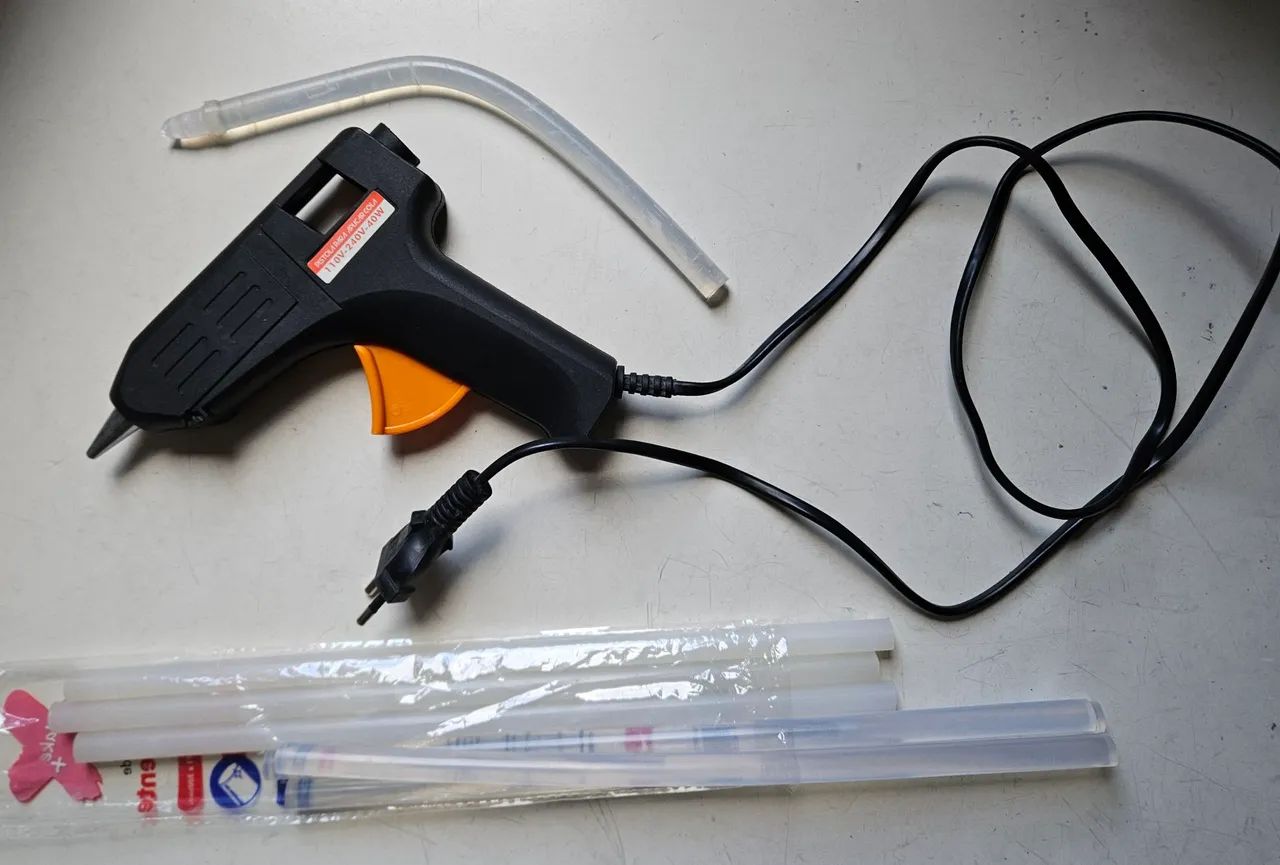 Pistola cola quente com bastões