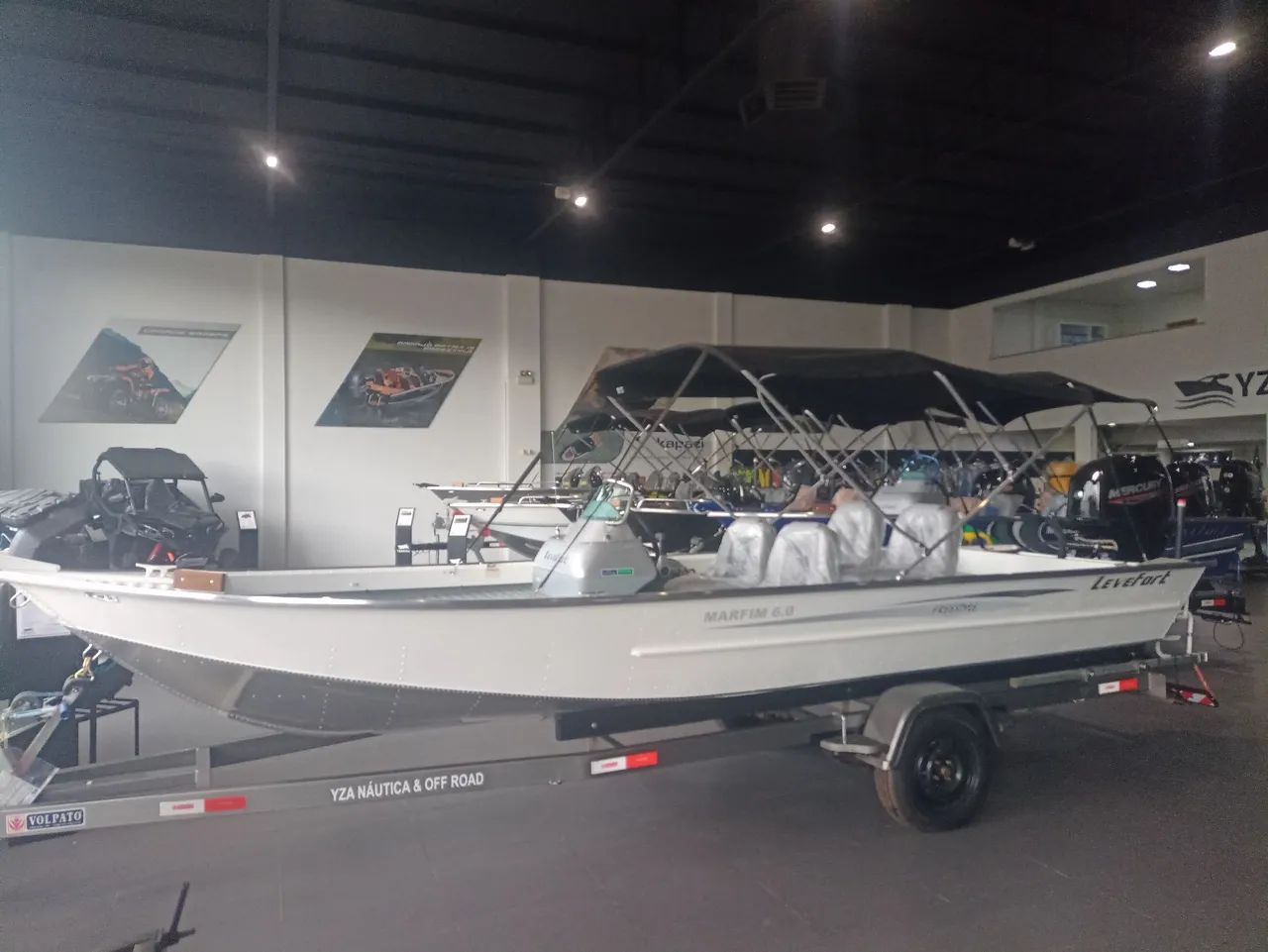 Lancha marfim 6.0 + motor 60hp Mercury  - Foto 10