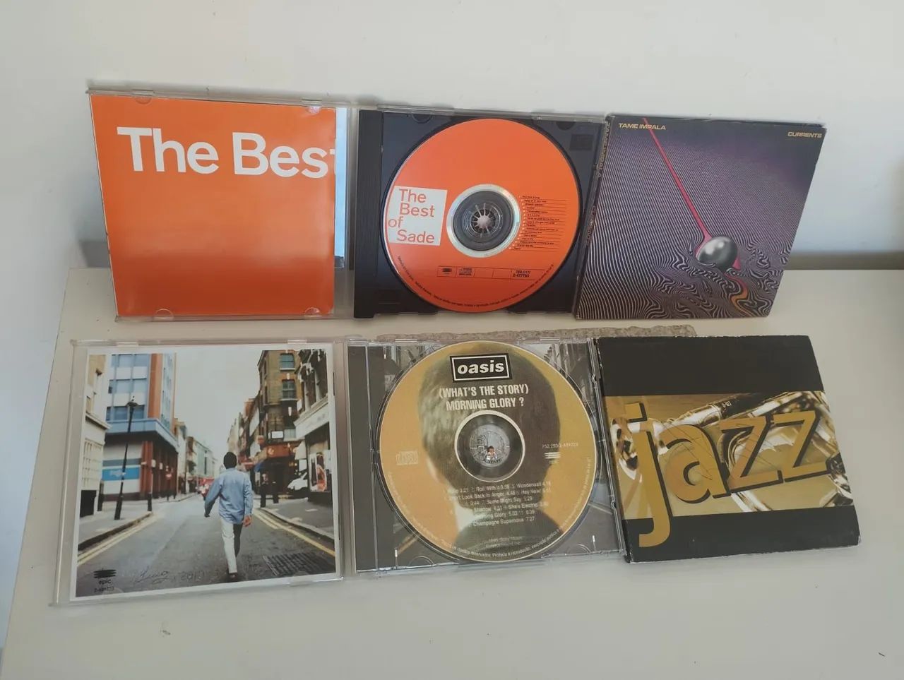 CDs de OASIS, Sade Adu e Tame Impala  - Foto 2