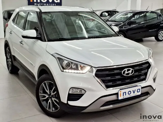 Creta Prestige 2.0 aut. couro terracota + multimidia branca 2018