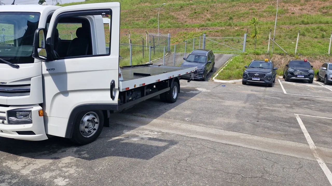 Motorista de Guinchos plataforma c Asa Delta CNH (D)