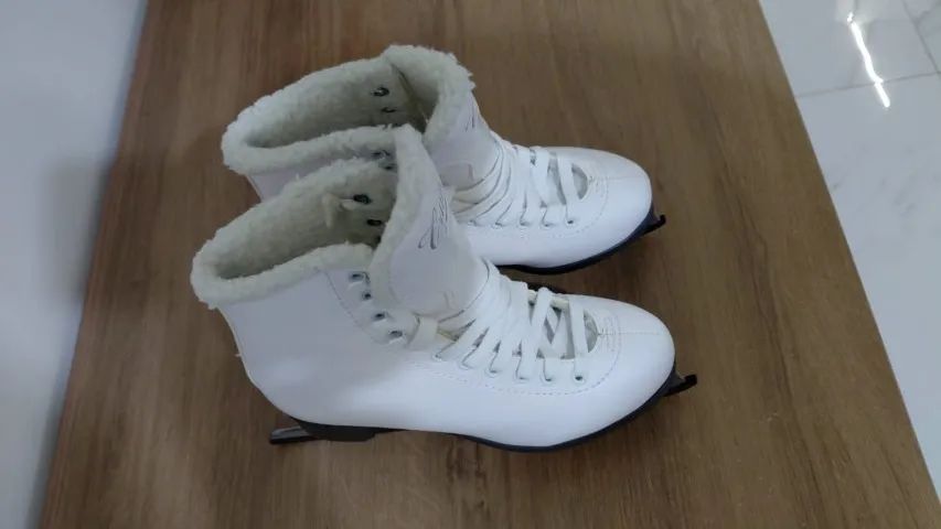 Patins de Gelo feminino tamanho 34 BR - Foto 5